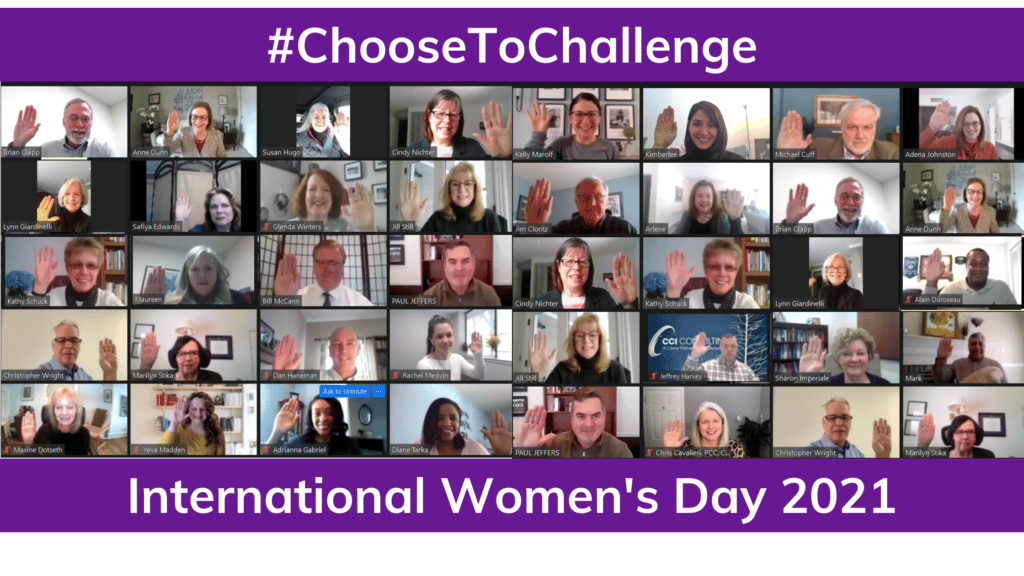 CCI Consulting Employees raise their hands in support of International Women's Day 2021 Choose to Challenge Campaign